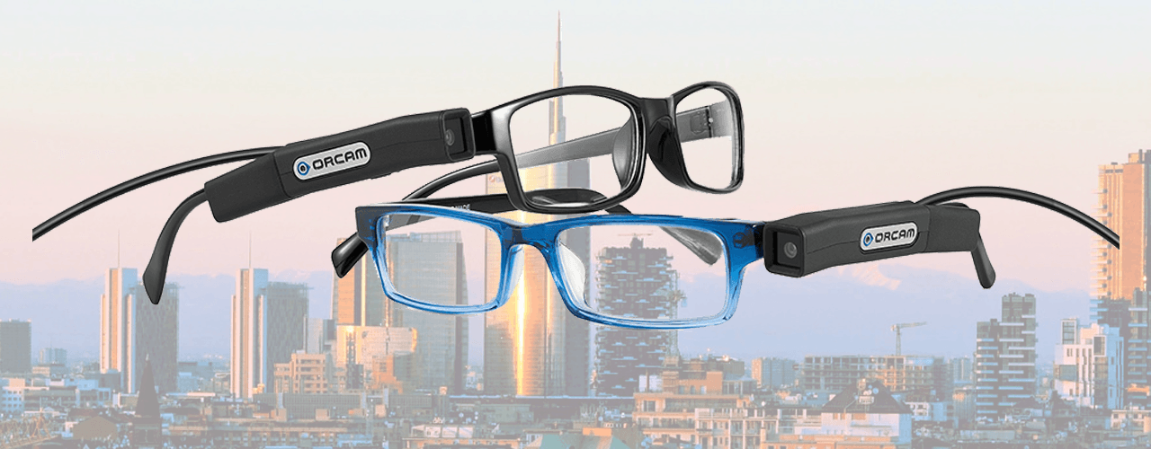 Immagine rappresentante Orcam sulla stanghetta dell'occhiale e la confezione